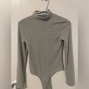 Grey body suit! Never worn in perfect condition